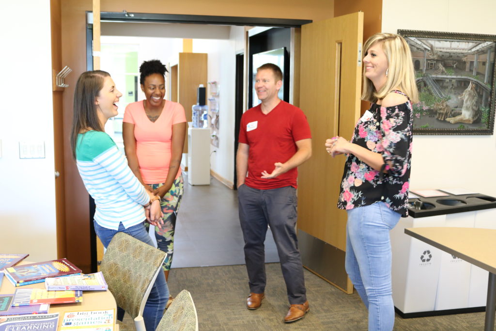 Small group of participants talking together