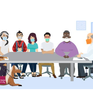 Seven community members wearing face masks are seated around a table in a small meeting style room.