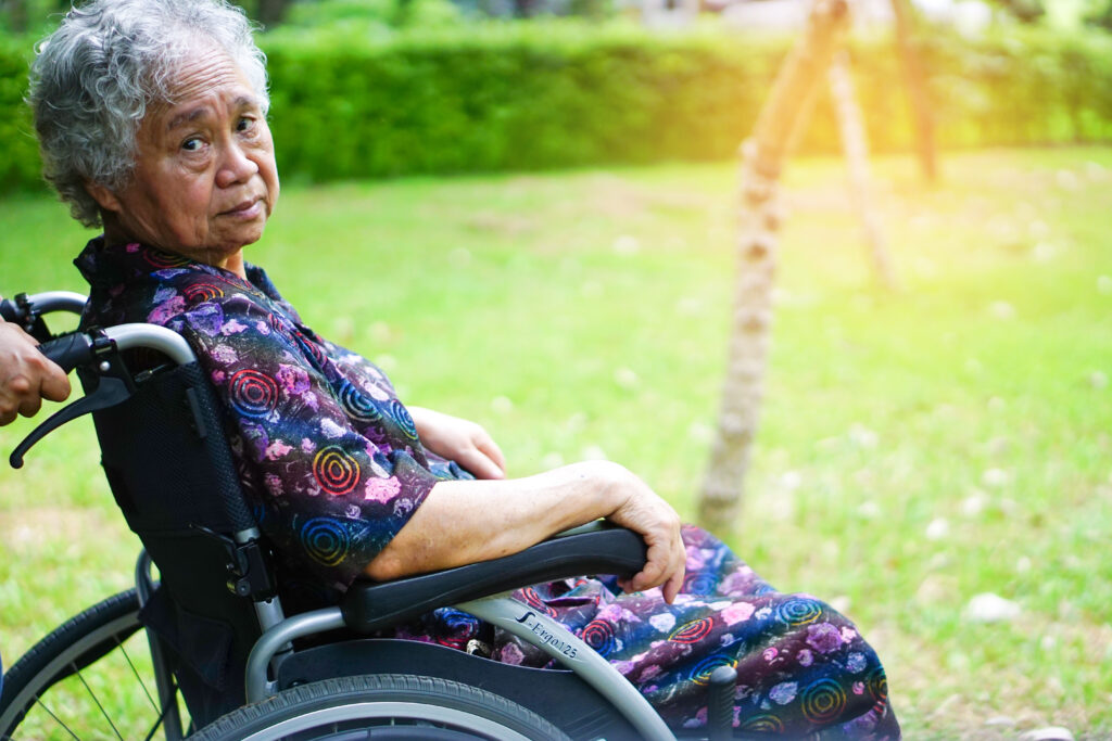 Asian senior or elderly old lady woman patient in wheelchair