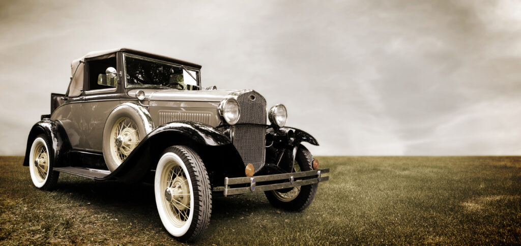 An old car in a field