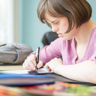 Closeup of a student sitting without peers close by