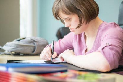 Closeup of a student sitting without peers close by